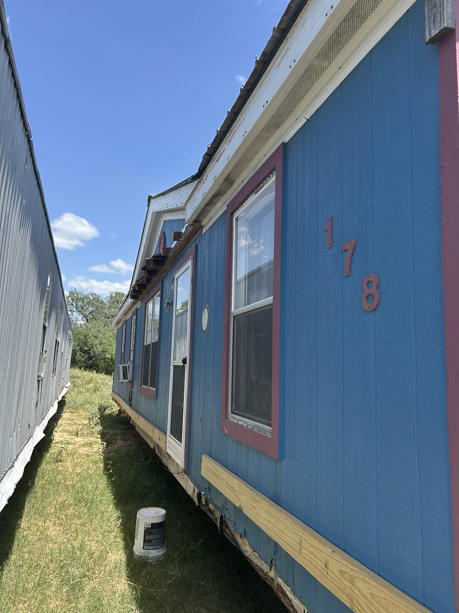 3 Bed / 2 Bath Double-Wide Handyman Special in Somerset TX — exterior front